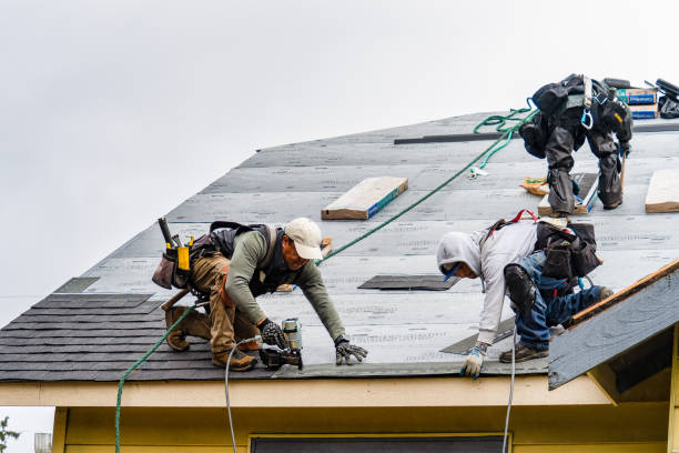 Professional Gutter Installation technician working in Flora, IN